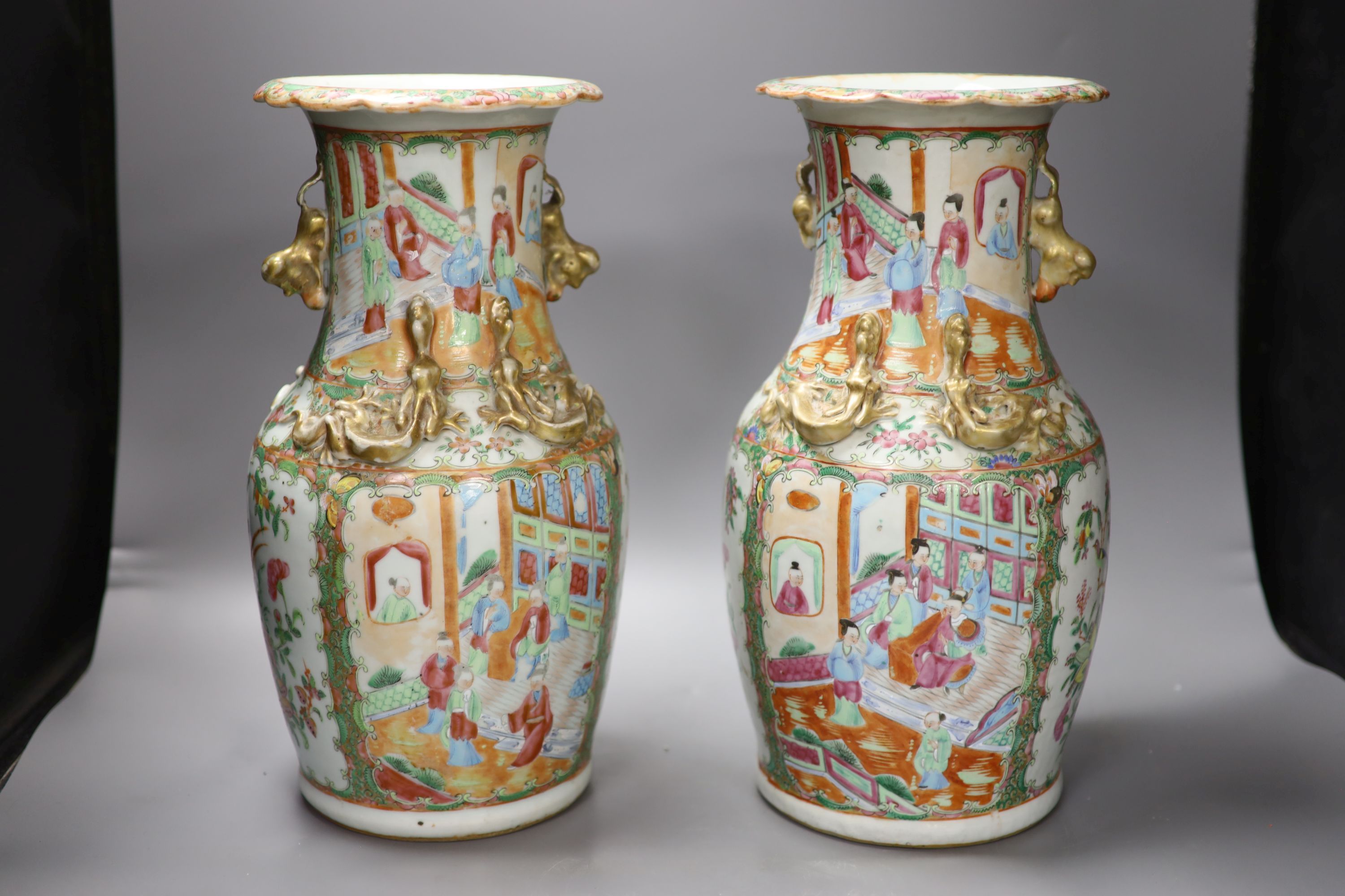A pair of late 19th century Chinese famille rose vases, height 36cm